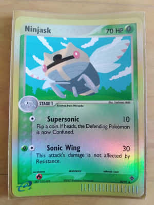 Caption: Iconic Ninjask Pokemon Trading Card Wallpaper