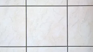 Caption: Impressive Cream-colored Ceramic Floor Tiles Wallpaper