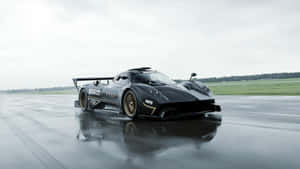 Caption: Impressive Pagani Zonda R In Full Speed On Track Wallpaper