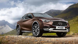 Caption: Infiniti Qx30 In A Serene Setting Wallpaper