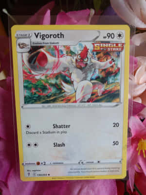 Caption: Intense Action Featuring Vigoroth Pokemon Card Wallpaper