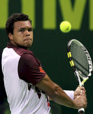 Caption: Intense Jo-wilfried Tsonga In Action. Wallpaper