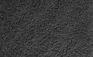 Caption: Intricate Stucco Texture Wall Design Wallpaper