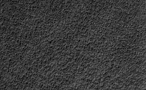 Caption: Intricate Stucco Texture Wall Design Wallpaper