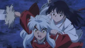 Caption: Inuyasha And Kagome's Enchanting Moment Wallpaper