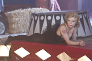Caption: Izabella Miko - Radiant And Captivating Wallpaper