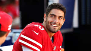 Caption: Jimmy Garoppolo In Action Wallpaper