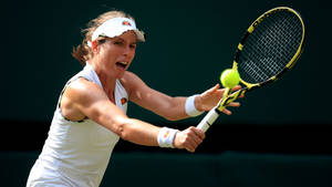 Caption: Johanna Konta Makes Impressive Backhand Return In Tennis Match Wallpaper