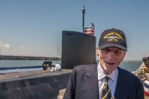 Caption: John Warner Serving In The U.s. Navy Wallpaper