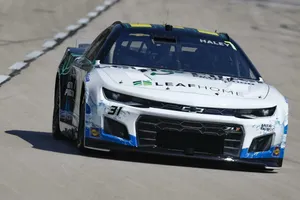 Caption: Justin Haley Triumphantly Drives His Number 16 White Racing Car. Wallpaper