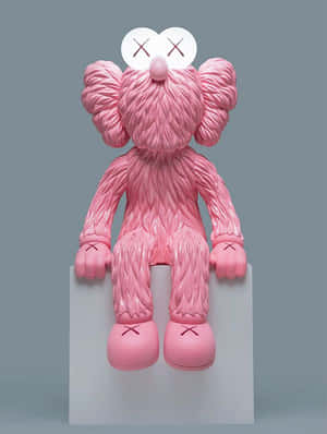 Caption: Kaws Bff Pink Artwork Displayed On A Wall Wallpaper