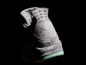 Caption: Kaws X Air Jordan Collaboration Sneaker Design Wallpaper