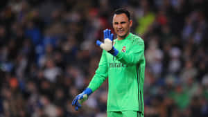 Caption: Keylor Navas Leaping To Make A Save Wallpaper