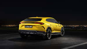 Caption: Lamborghini Urus - The Ultimate Luxury Suv In Action Wallpaper