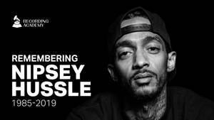 Caption: Legendary Rapper Nipsey Hussle On Stage Wallpaper