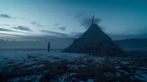 Caption: Leonardo Dicaprio In The Revenant Battling The Harsh Winter Wallpaper