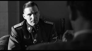 Caption: Liam Neeson As Oskar Schindler In Schindler's List Wallpaper