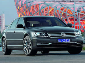 Caption: Luxurious Volkswagen Phaeton Gliding Through The Serene Countryside Wallpaper