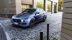 Caption: Luxury In Motion: The Majestic Maserati Levante Wallpaper