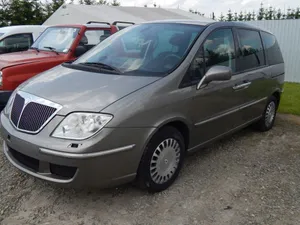 Caption: Luxury Lancia Phedra Minivan On The Road Wallpaper