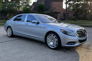 Caption: Luxury Unleashed: Maybach S600 In Its Majestic Grandeur Wallpaper