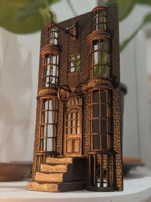 Caption: Magical Diagon Alley Bustling With Wizards And Witches Wallpaper