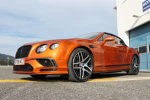 Caption: Magnificent Bentley Continental Supersports In Action Wallpaper