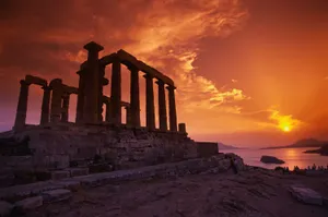 Caption: Magnificent Sunset Over Poseidon's Temple In Sounion Wallpaper