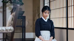 Caption: Main Characters From The Handmaiden In A Scene From The Movie Wallpaper