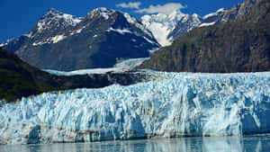 Caption: Majestic Glacier Face In Glacier Bay National Park Wallpaper