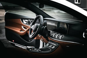 Caption: Majestic Interior Of Mercedes E200 Steering Wheel Wallpaper