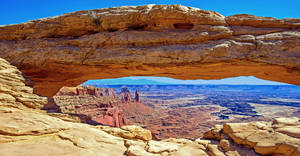 Caption: Majestic Long Rock Formation In Canyonlands National Park Wallpaper