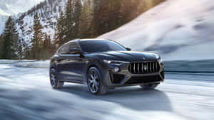 Caption: Majestic Maserati Levante In Motion Wallpaper