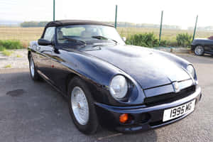 Caption: Majestic Mg Rv8 - An Epitome Of Classic British Design Wallpaper