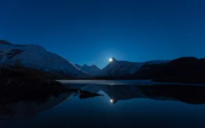 Caption: Majestic Moon Terrain Wallpaper