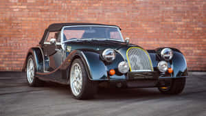 Caption: Majestic Morgan Plus 8 In Full Speed Wallpaper