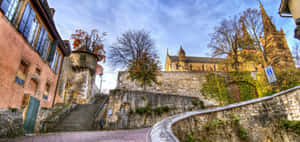 Caption: Majestic Neuchâtel Lake At Sunset, Switzerland Wallpaper