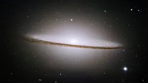 Caption: Majestic Sombrero Galaxy Swirling In Celestial Wonder Wallpaper