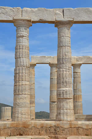 Caption: Majestic Sunset At The Temple Of Poseidon, Greece Wallpaper