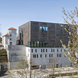 Caption: Majestic Sunset Over Arendal Bay Wallpaper