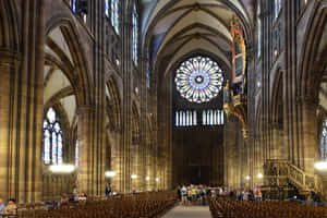 Caption: Majestic View Of Strasbourg Cathedral, France Wallpaper