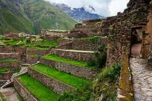 Caption: Majestic View Of The 150-step Staircase In Ollantaytambo Wallpaper
