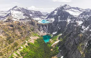 Caption: Majestic View Of The Multi-layered Mountains In Glacier National Park Wallpaper