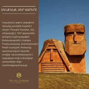 Caption: Majestic View Of We Are Our Mountains Monument Wallpaper