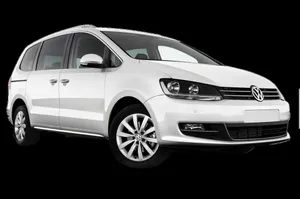 Caption: Majestic Volkswagen Sharan In Stunning Backdrop Wallpaper