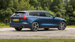 Caption: Majestic Volvo V60 In Its Natural Habitat Wallpaper