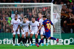 Caption: Master At Work - Lionel Messi At A Free Kick Moment Wallpaper