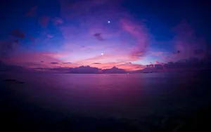 Caption: Mesmerizing Purple Sunset Wallpaper