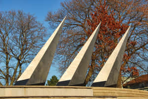 Caption: Mesmerizing Sunset Over Moncton Cityscape Wallpaper