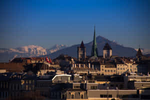 Caption: Mesmerizing View Of Carouge At Sunset Wallpaper